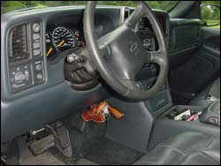 Grassbur's all-leather mountable gun holster can be used for in-vehicle storage of sidearms.