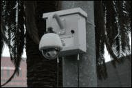 A network camera is positioned above the New Orleans streets, and features PTZ for police control, working through a city-wide wireless network.