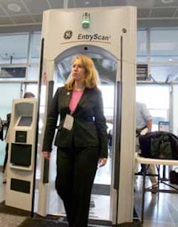 Ann Davis, public affairs manager of Transportation Security Administration, goes through an Explosives Detection Trace Portal machine during a demonstration at the Logan International Airport in Boston, Monday, April 25, 2005. The TSA announced Monday it Ann Davis, public affairs manager of Transportation Security Administration, goes through an Explosives Detection Trace Portal machine during a demonstration at the Logan International Airport in Boston, Monday, April 25, 2005. The TSA announced Monday it