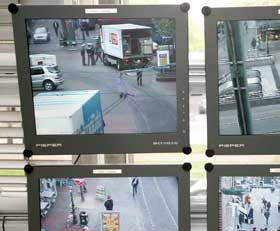 Monitors at a police station in Dusseldorf show street scenes in the city's old quarter.