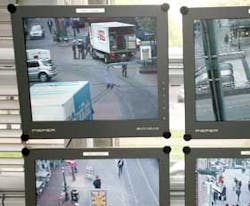 Monitors at a police station in Dusseldorf show street scenes in the city's old quarter. Monitors at a police station in Dusseldorf show street scenes in the city's old quarter.
