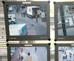Monitors at a police station in Dusseldorf show street scenes in the city&apos;s old quarter.