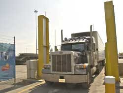 A truck passes through new Radiation Portal Monitors, May 2, 2005, as it exits the terminal at Jaxport in Jacksonville, Fla. The U.S. Customs and Border Protection will use the monitors to scan every shipment leaving the port. Jaxport is the first in Flor