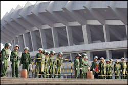 Paramilitary police stand outside the stadium before the 2005 Asian Champions League match between Japan&apos;s Yokohama F Marinos and China&apos;s Shandong Luneng in Jinan in China&apos;s Shandong province Wednesday, May 11, 2005. Thousands of police, security guard