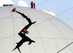 Greenpeace activists were able to breach security and paint a crack on a nuclear reactor in the Netherlands.