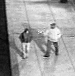 In this handout photo released by the Philadelphia Police Department, a Tuesday, May 17, 2005, video still shows murder victim Patricia McDermott, left, and her unidentified killer moments before McDermott was shot on a downtown Philadelphia street. McDer In this handout photo released by the Philadelphia Police Department, a Tuesday, May 17, 2005, video still shows murder victim Patricia McDermott, left, and her unidentified killer moments before McDermott was shot on a downtown Philadelphia street. McDer