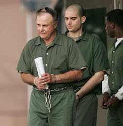 Ronald Allen Grecula, left, is transported from the federal courthouse after making a court appearance Monday, May 23, 2005 in Houston. Grecula has been charged for his involvement in attempting to build and sell an explosive device to an affiliate of al- Ronald Allen Grecula, left, is transported from the federal courthouse after making a court appearance Monday, May 23, 2005 in Houston. Grecula has been charged for his involvement in attempting to build and sell an explosive device to an affiliate of al-