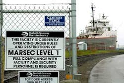 A freighter is berthed Wednesday, May 25, 2005, at a Duluth , Minn., Seaway Port Authority dock awaiting cargo as signs and fencing warn trespassers of extra security in place since Sept. 11. Government programs aimed at keeping weapons of mass destructio