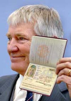 German Interior Minister Otto Schily presents the new biometric German Passport at the Federal News Conference in Berlin on Wednesday, June 1, 2005. German Interior Minister Otto Schily presents the new biometric German Passport at the Federal News Conference in Berlin on Wednesday, June 1, 2005.