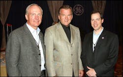 GE Infrastructure, Security CEO Ken Boyda (left) and VP Global Sales and Marketing Jim Clark (right) join Tom Ridge following a presentation in which he called for the security industry to help integrate people and technology in the fight against terror.