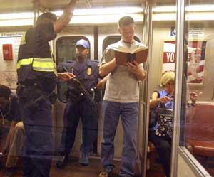 Washington Metropolitan Transit Police, visibly carrying automatic weapons, increase their presence on the Metro in the nation's capital Thursday, July 7, 2005, following a series of explosions on the London transit systems.