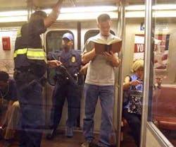 Washington Metropolitan Transit Police, visibly carrying automatic weapons, increase their presence on the Metro in the nation&apos;s capital Thursday, July 7, 2005, following a series of explosions on the London transit systems.