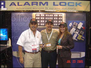 Jim Yocum (left) and Margaret Hopkins (right) were the winners in Alarm Lock Systems's Harley-Davidson giveaway contest.