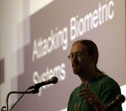 A security analyst who goes by the name &apos;Zamboni&apos; speaks about attacking Biometric Systems at the Defcon Convention Friday, July, 29, 2005 in Las Vegas. Defcon is where Internet security experts, law enforcement officials and hackers are supposed to share