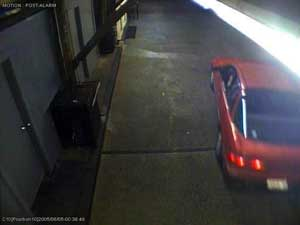 This video grab provided by the Campbell Police Department show's a red Acura seen by security cameras Friday, Aug. 5, 2005, that may have purposely ran over and killed 10 ducks living in a pond at the Delta Queen Classic Car Wash in Campbell, Calif. A ma