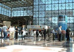 On Wednesday morning, dealers trickled in around 10 a.m. to check out the show floor, but first they had to register under the airy architecture of the Javits Center. On Wednesday morning, dealers trickled in around 10 a.m. to check out the show floor, but first they had to register under the airy architecture of the Javits Center.