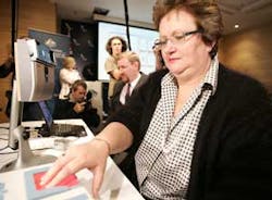 Senator Amanda Vanstone, right, places her hand on a finger print scanner during a biometric system demonstration at Sydney International Airport in Australia, Thursday, Sept. 29, 2005. Senator Vanstone announced that in a bid to enhance border security, Senator Amanda Vanstone, right, places her hand on a finger print scanner during a biometric system demonstration at Sydney International Airport in Australia, Thursday, Sept. 29, 2005. Senator Vanstone announced that in a bid to enhance border security,