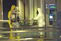 A portion of the Amtrak waiting area closed for about two hours at Pennsylvania Station while New York City and Amtrak police officers in special bio-chemical suits investigate a suspicious package on Friday, Oct. 7, 2005.