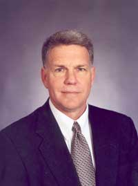 Con-Way Transportation's security director Curt Shewchuk has to make sure he can meet goverment transportation security standards, as well as manage more than 450 facilities and some 18,000 employees spread out among 20 countries.