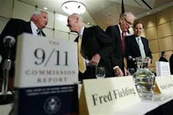 Thomas H. Kean, chair, right, of the Sept. 11 Public Discourse Project, Lee H. Hamilton, vice chairman, sewcond from right and members Fred F. Fielding and Slade Gorton, left, prepare for a news conference to issue a final assessment of progress on the co
