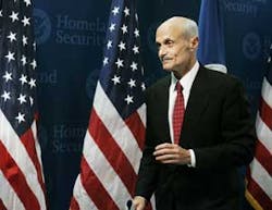 Homeland Security Secretary Michael Chertoff, leaves a news conference on 2006 Urban Area Security Initiative Grants, Tuesday, Jan. 3, 2006, in Washington. Communities facing greater risks will receive a bigger share of federal grants this year to counter