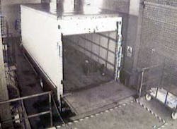 This image released by British Police Thursday Feb. 23, 2006, made from CCTV at the Securitas depot in Tonbridge, England, showing a white lorry which was used by robbers who stole an estimated 43 million pounds (euro62 million or US$74 million) in the ea