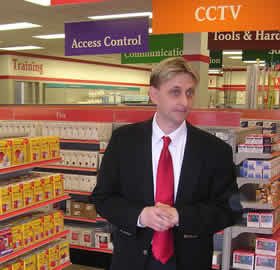 ADI's national merchandiser Herb Albinus showcases the new look of ADI's Las Vegas location, which pulls consumer-style retail lessons to the world of security and fire products distribution.