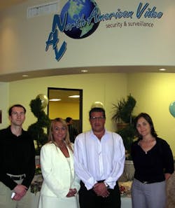 Prior to the opening of the ISC West show, North American Video opened up its new Las Vegas location for a tour. Pictured are NAV President Cynthia Freschi (in white), NAV Large Systems Sales Manager Ron Freschi (white shirt), flanked by media representat Prior to the opening of the ISC West show, North American Video opened up its new Las Vegas location for a tour. Pictured are NAV President Cynthia Freschi (in white), NAV Large Systems Sales Manager Ron Freschi (white shirt), flanked by media representat