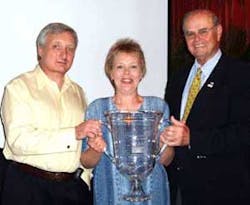 Vector Security accepts the 'Central Station of the Year' award from the CSAA. Pictured left to right are David Merrick, Marketing Director, Vector Security; Lisa Laboda, West District Central Station Training Manager, Vector Security; and John A. Murphy, Vector Security accepts the 'Central Station of the Year' award from the CSAA. Pictured left to right are David Merrick, Marketing Director, Vector Security; Lisa Laboda, West District Central Station Training Manager, Vector Security; and John A. Murphy,