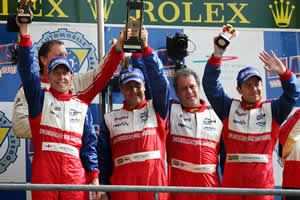 Victors for the second year running in the LMP2 class, pictured (L-R) are Andy Wallace - driver, Mike Newton - driver and AD Group CEO, Adam Wiseberg - AD Group Director and Thomas Erdos - driver.