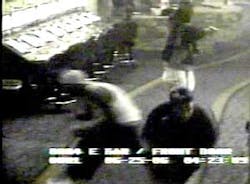 This image from a surveillance camera released by the North Las Vegas, Nev. Police Dept. shows a gunman, back, shooting in an off-strip casino Sunday, June 25, 2006, after someone splashed a drink in his face, authorities said. The man shot two people, ki This image from a surveillance camera released by the North Las Vegas, Nev. Police Dept. shows a gunman, back, shooting in an off-strip casino Sunday, June 25, 2006, after someone splashed a drink in his face, authorities said. The man shot two people, ki