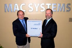 John Moss of S2 Security Corporation recognizes Bob McMenimon of systems integrator MAC Systems. John Moss of S2 Security Corporation recognizes Bob McMenimon of systems integrator MAC Systems.
