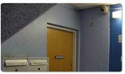 A network surveillance camera monitors every entryway at the Mjolner Park public housing complex in Copenhagen. A network surveillance camera monitors every entryway at the Mjolner Park public housing complex in Copenhagen.