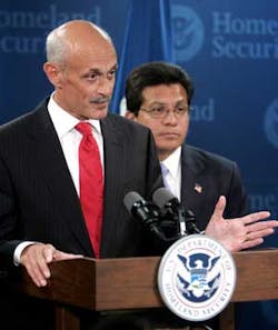 Homeland Security Secretary Michael Chertoff, left, and Attorney General Alberto R. Gonzales hold a press briefing, Thursday, Aug. 10, 2006, in Washington about the terror threat uncovered in Britain. The U.S. government raised its threat warning to the h