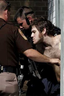 CHRISTIANSBURG VA USA -- Escaped inmate William Morva, is escorted out of the Montgomery County magistrate's office Monday, Aug. 21, 2006, in Christiansburg, Va. After a massive manhunt that shut down the Virginia Tech campus in Blacksburg, Va., on the fi CHRISTIANSBURG VA USA -- Escaped inmate William Morva, is escorted out of the Montgomery County magistrate's office Monday, Aug. 21, 2006, in Christiansburg, Va. After a massive manhunt that shut down the Virginia Tech campus in Blacksburg, Va., on the fi