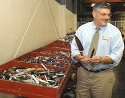Steve Ekin, director of the Georgia Surplus Property Division, shows some of the items discarded by travelers at Hartsfield-Jackson Atlanta International Airport during security checks, at the surplus property division 'Thrift Store' in Tucker, Ga. Tuesda Steve Ekin, director of the Georgia Surplus Property Division, shows some of the items discarded by travelers at Hartsfield-Jackson Atlanta International Airport during security checks, at the surplus property division 'Thrift Store' in Tucker, Ga. Tuesda