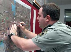 Part of a military exercise called 'Eternity' with soldiers from three neighboring countries, Azerbaijan, Georgia and Turkey, Lt. Col. David Rukhadze from Georgia works on an intelligence situation map in Ankara, Turkey, Friday, Sept. 29, 2006. The exerci Part of a military exercise called 'Eternity' with soldiers from three neighboring countries, Azerbaijan, Georgia and Turkey, Lt. Col. David Rukhadze from Georgia works on an intelligence situation map in Ankara, Turkey, Friday, Sept. 29, 2006. The exerci