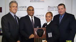 Gary Green, CEO, Alliance Building Services; Amable Arias, honoree; Dayanara Martinez, honoree; David A. Reiss, senior vice president, Classic Security.