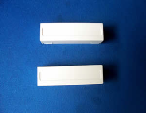 Tane's GP-23 surface mount contact includes a cover to hide screws, allowing for 'cleaner' installations.