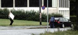 An image shows a thief escaping with one of Munch's masterpieces to an awaiting car in Oslo. An image shows a thief escaping with one of Munch's masterpieces to an awaiting car in Oslo.