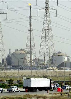 Police stop vehicles at a checkpoint near an oil refinery in Jubail, Saudi Arabia, in this June 1, 2004 file photo. Police have arrested 172 Islamic militants, some of whom were being trained abroad as pilots so they could fly aircraft in attacks on Saudi Police stop vehicles at a checkpoint near an oil refinery in Jubail, Saudi Arabia, in this June 1, 2004 file photo. Police have arrested 172 Islamic militants, some of whom were being trained abroad as pilots so they could fly aircraft in attacks on Saudi