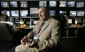 Columbus OH USA -- OhioHealth security director Charles Smith talks as the surveillance monitors in the background show various points of Riverside Hospital, Wednesday, May 23, 2007, in Columbus, Ohio. Smith worries about the added cost of licensing his e