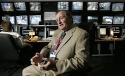 Columbus OH USA -- OhioHealth security director Charles Smith talks as the surveillance monitors in the background show various points of Riverside Hospital, Wednesday, May 23, 2007, in Columbus, Ohio. Smith worries about the added cost of licensing his e Columbus OH USA -- OhioHealth security director Charles Smith talks as the surveillance monitors in the background show various points of Riverside Hospital, Wednesday, May 23, 2007, in Columbus, Ohio. Smith worries about the added cost of licensing his e