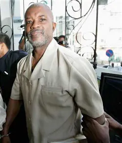 Guyanan Abdul Kadir, 55, arrives at the Magistrate Court for an extradition hearing in downtown Port-of-Spain, Trinidad, Monday, June 4, 2007. Kadir and Trinidadian Kareem Ibrahim, who are in custody of the Trinidad's authorities, are suspects in a plot t Guyanan Abdul Kadir, 55, arrives at the Magistrate Court for an extradition hearing in downtown Port-of-Spain, Trinidad, Monday, June 4, 2007. Kadir and Trinidadian Kareem Ibrahim, who are in custody of the Trinidad's authorities, are suspects in a plot t