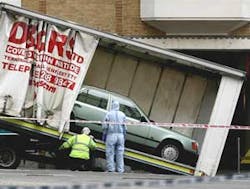 A Mercedes is loaded onto a truck in Haymarket Street, near Piccadilly, central London on Friday, June 29, 2007. The Mercedes was said to contain a car bomb.