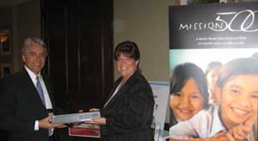 Mission 500 raffle winner Deanna Blair at the California Alarm Association winter conference