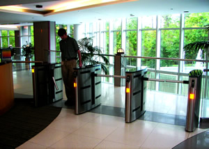 The Boon Edam Speedlane 996DA is an optical turnstile with a drop arm mechanism.