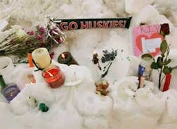 Flowers, candles, and small notes sit in the snow Friday, Feb. 15, 2008, on the campus of Northern Illinois University near Cole Hall, the scene where a lone gunman shot and killed six Thursday on the NIU in DeKalb, Ill. Flowers, candles, and small notes sit in the snow Friday, Feb. 15, 2008, on the campus of Northern Illinois University near Cole Hall, the scene where a lone gunman shot and killed six Thursday on the NIU in DeKalb, Ill.