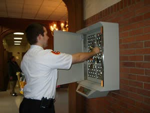 Adam Panisiak, coordinator of keys and access control at the Southern Baptist Theological Seminary in Louisville, Ky., uses one of the Morse Watchmans KeyWatcher units.