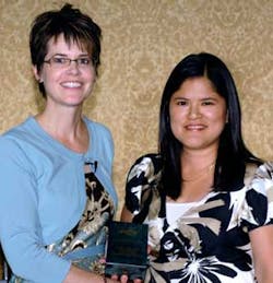 Zanoe Jalomo (right) accepts the award for Outstanding Customer Service Team at PSA-TEC 2008. Zanoe Jalomo (right) accepts the award for Outstanding Customer Service Team at PSA-TEC 2008.